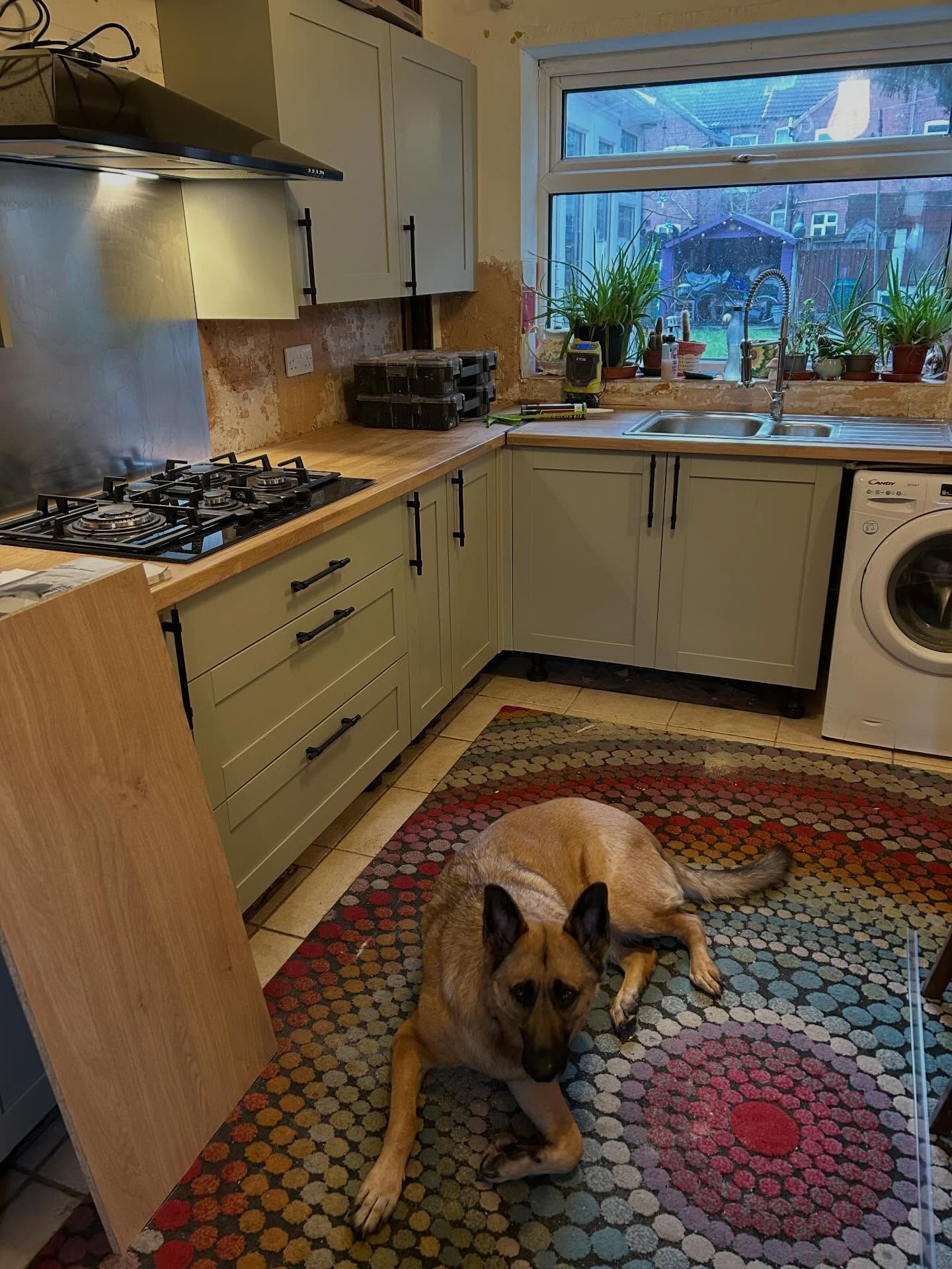Howdens kitchen fitted with tiling